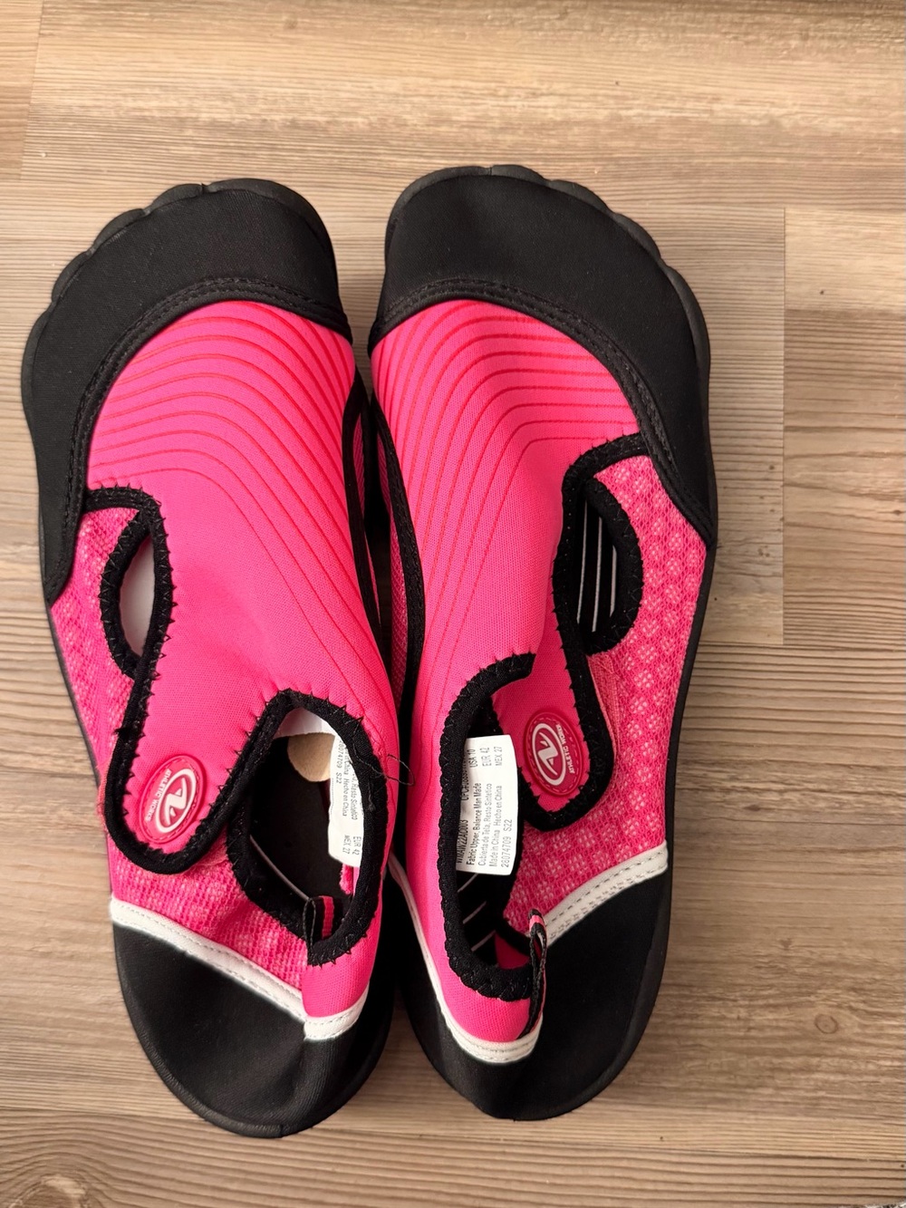 womens pink and black water shoes size 10